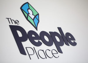 the people place signage